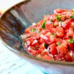 Best pico de Gallo in a blue bowl on a marble countertop