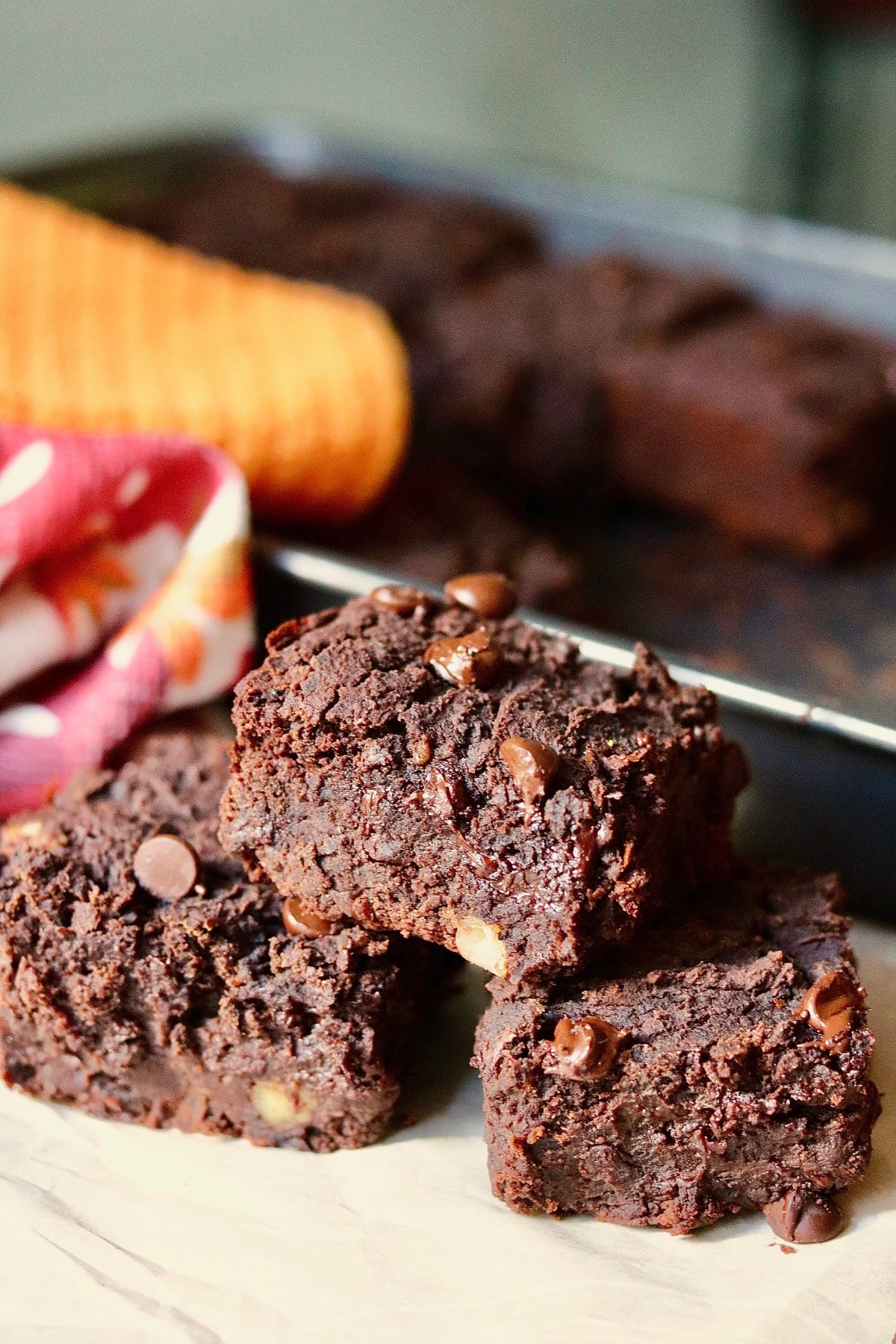 vegan black bean brownies cut into squares on a cutting board