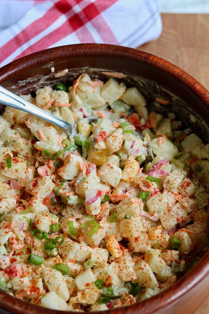 side view of potato salad in a salad bowl