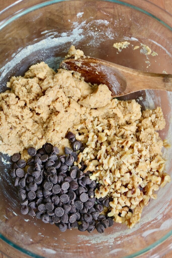 ingredients for chocolate chip cookies in a mixing bowl