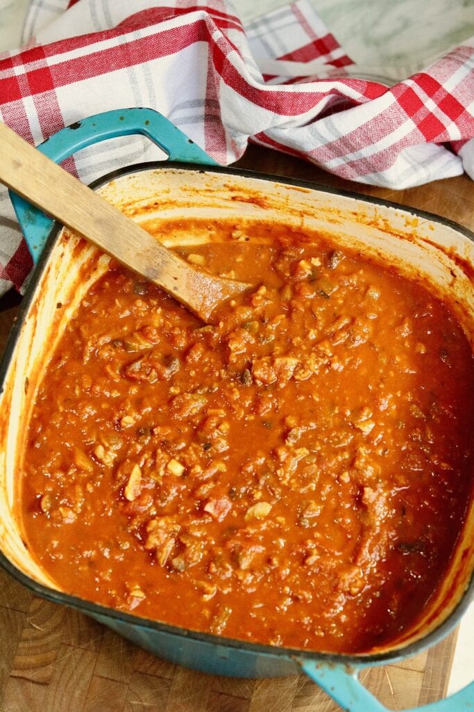 ingredients for vegan bolognese sauce simmering in a pot