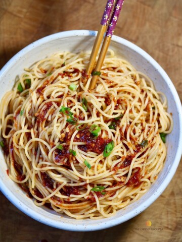 sweet & spicy garlic noodles in a white bowl