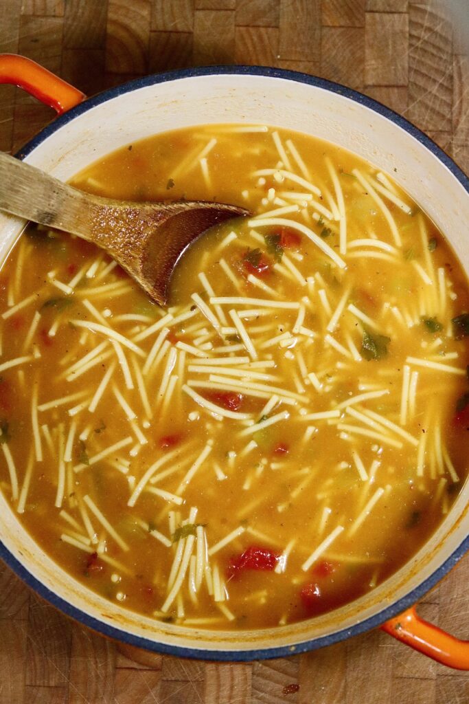 a pot of sopa de fideo ready to serve 