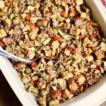 vegan wild rice stuffing baked in a casserole dish