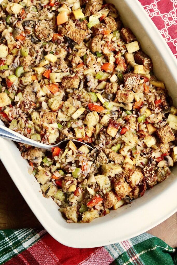 vegan wild rice stuffing baked in a casserole dish