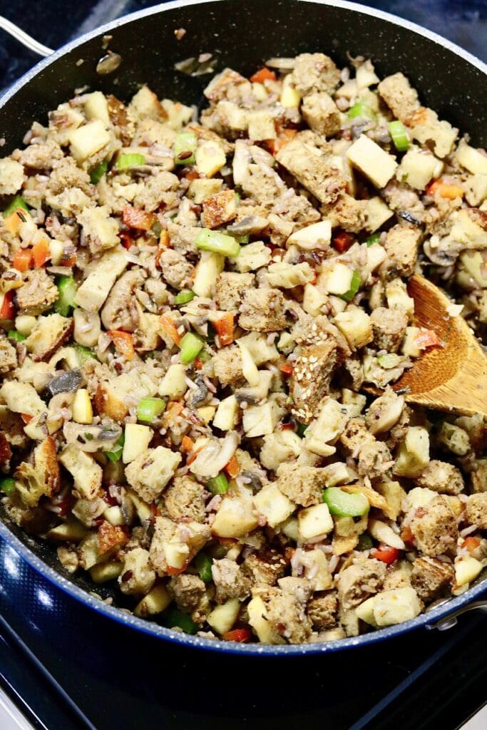 vegan stuffing ingredients in a pan on the stovetop