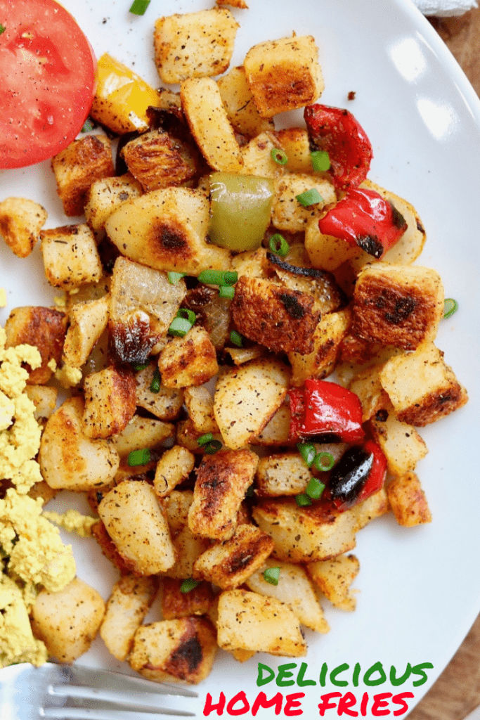 best home fries recipe on a white plate with peppers and onions
