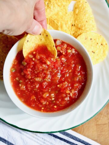 restaurant style salsa in bowl served with corn tortilla chips