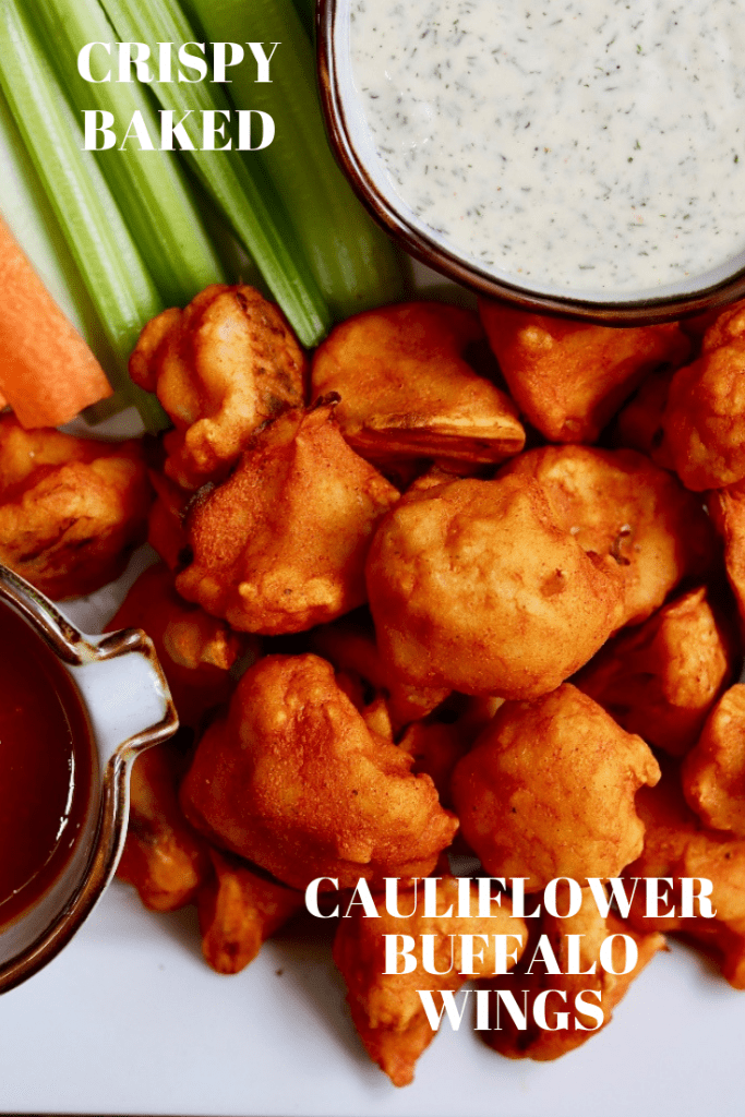 buffalo cauliflower wings served with veggies and vegan ranch dressing
