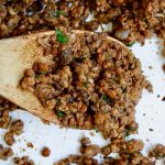 vegan taco meat on a wooden spoon