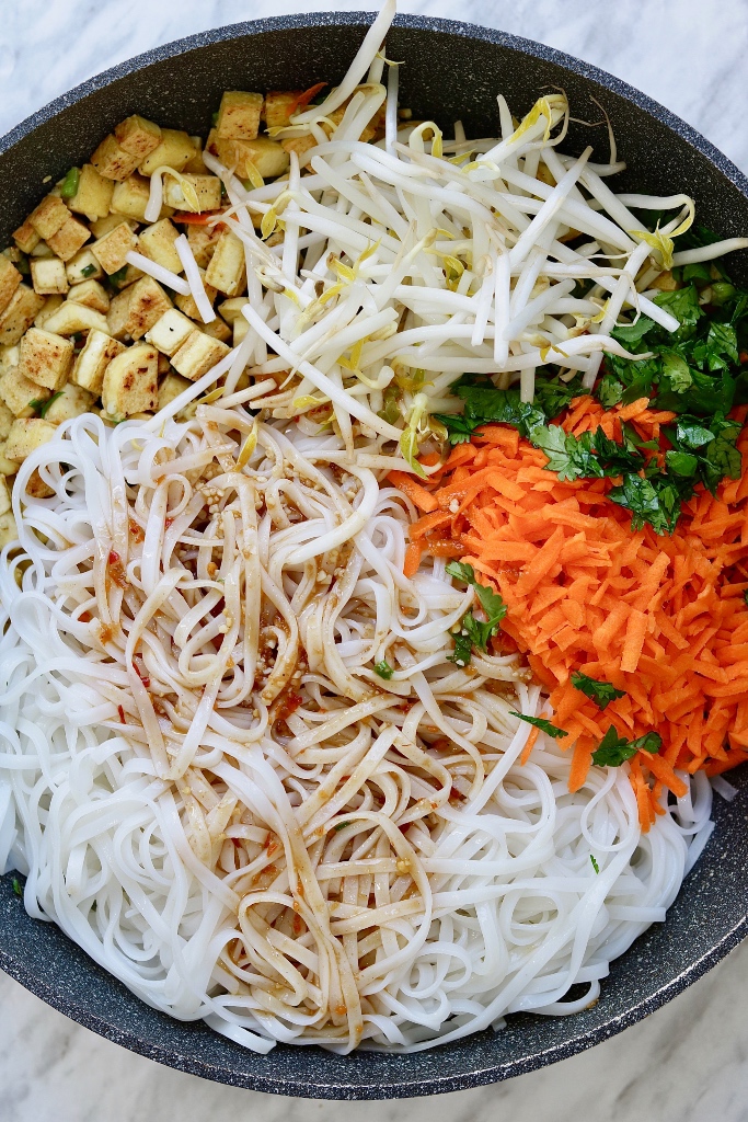ingredients for vegan pad thai in a skillet ready to be tossed