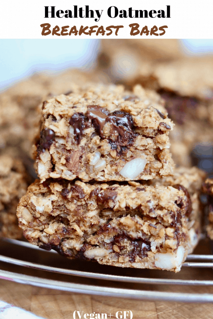 healthy oatmeal breakfast bars stacked on a cooling rack