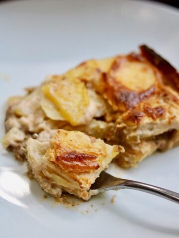 vegan scalloped potatoes on a fork