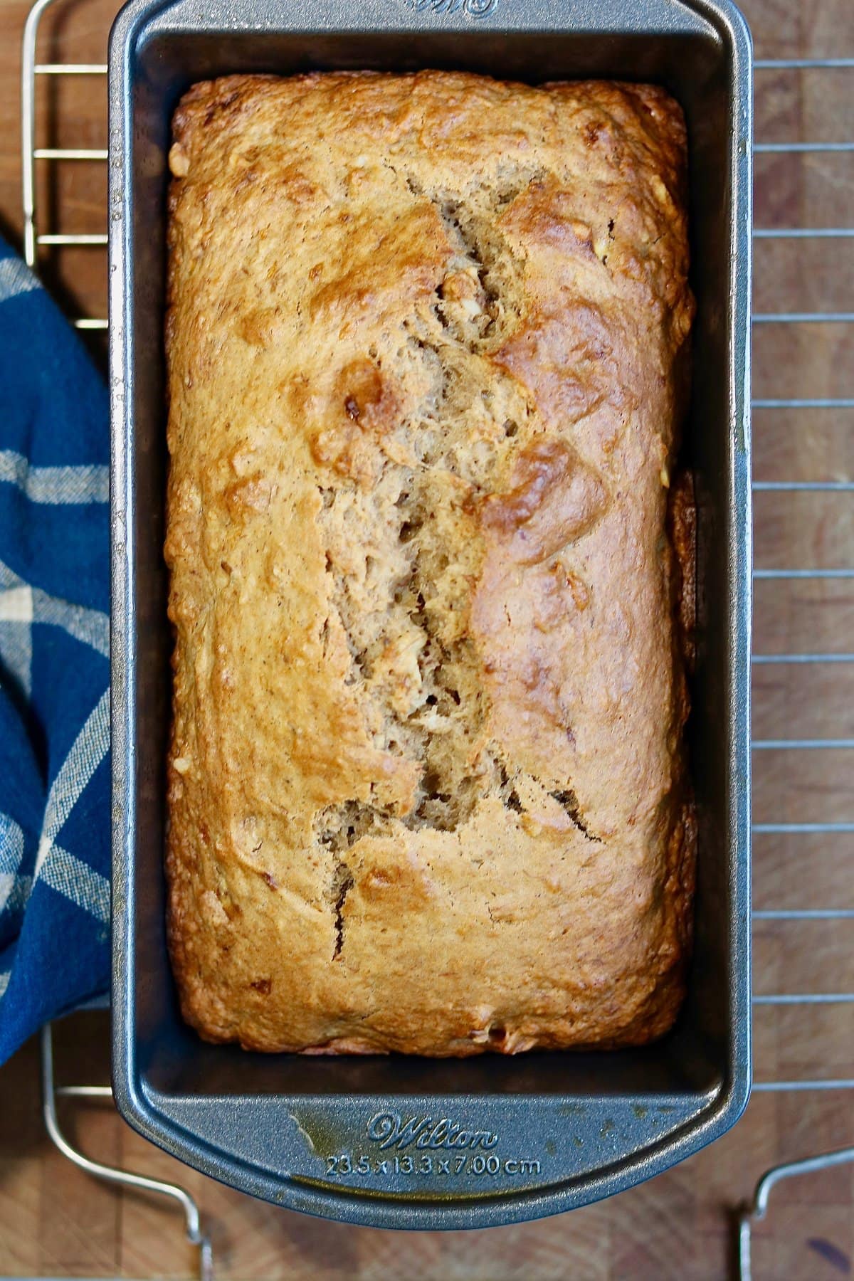a loaf of vegan banana bread baked in a loaf pan