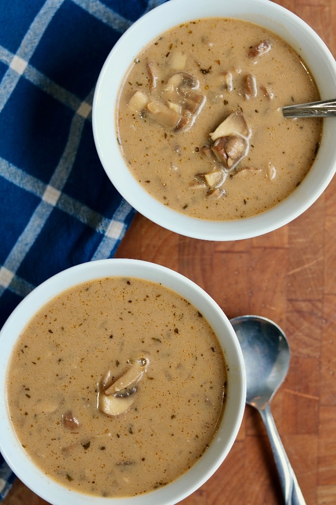 vegan cream of mushroom soup in two white bowls