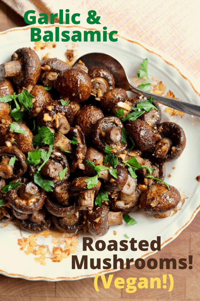 roasted mushrooms in a serving dish with fresh parsley on top