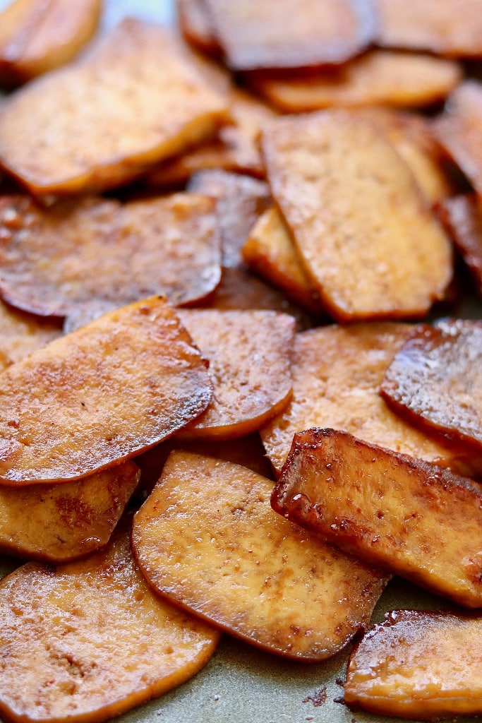 tofu bacon piled on a baking sheet