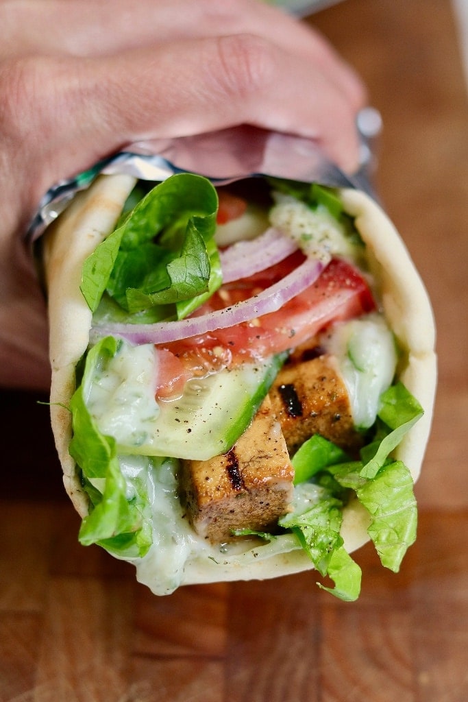 vegan gyro being held