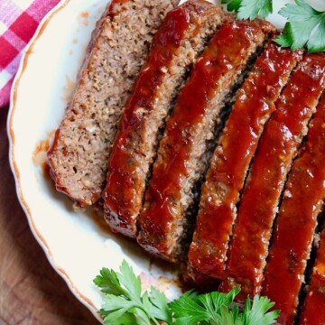 vegan meatloaf sliced on a platter