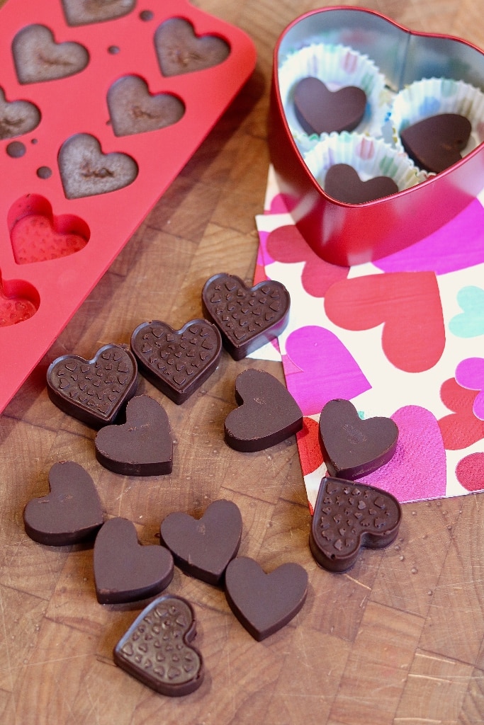 homemade chocolates on a table with candy mold 