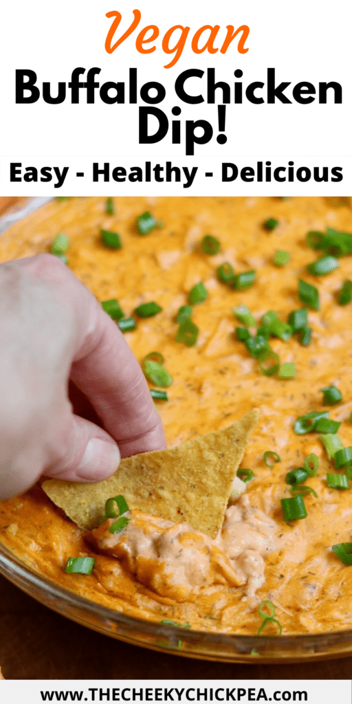 vegan buffalo chicken dip being scooped with tortilla chip