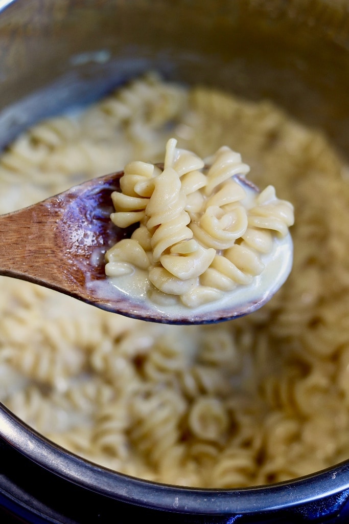 garlic pasta being served from instant pot