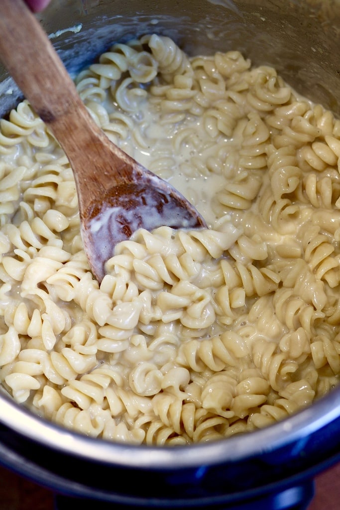 overhead view creamy garlic pasta ready in instant pot 