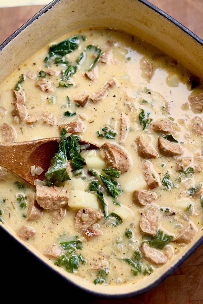 overhead view of a pot of vegan zuppa toscana soup
