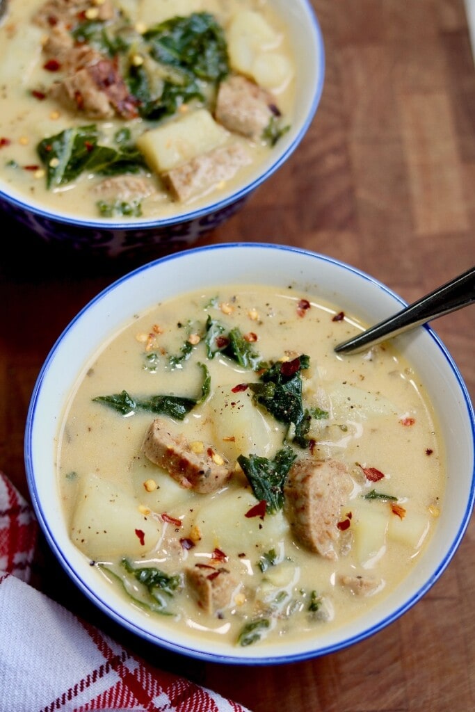 two bowls of zuppa toscana soup