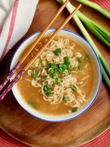ramen soup in a bowl with chopsticks