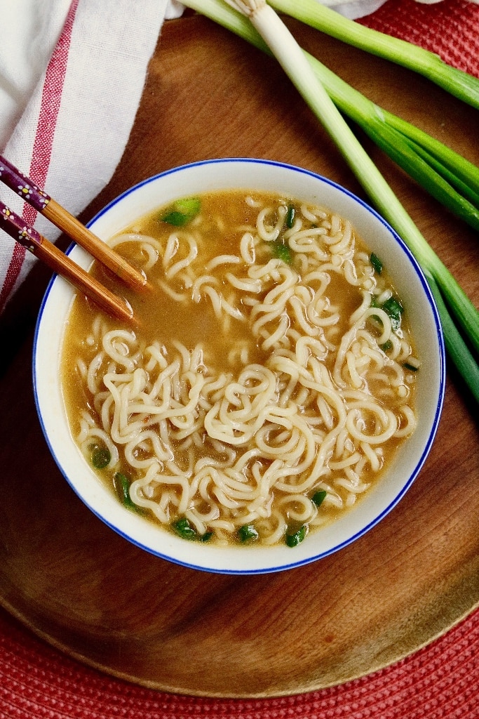 a bowl of vegan ramen with chopsticks 