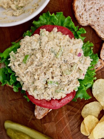 vegan tuna salad piled on open faced sandwich