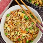 vegan fried rice in a bowl with chopsticks