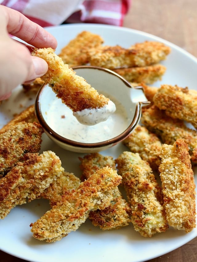 zucchini fries on a platter with ranch dip