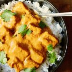 vegan tikka masala with crispy tofu in a bowl with basmati rice