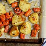 potatoes and carrots roasted on a sheet pan