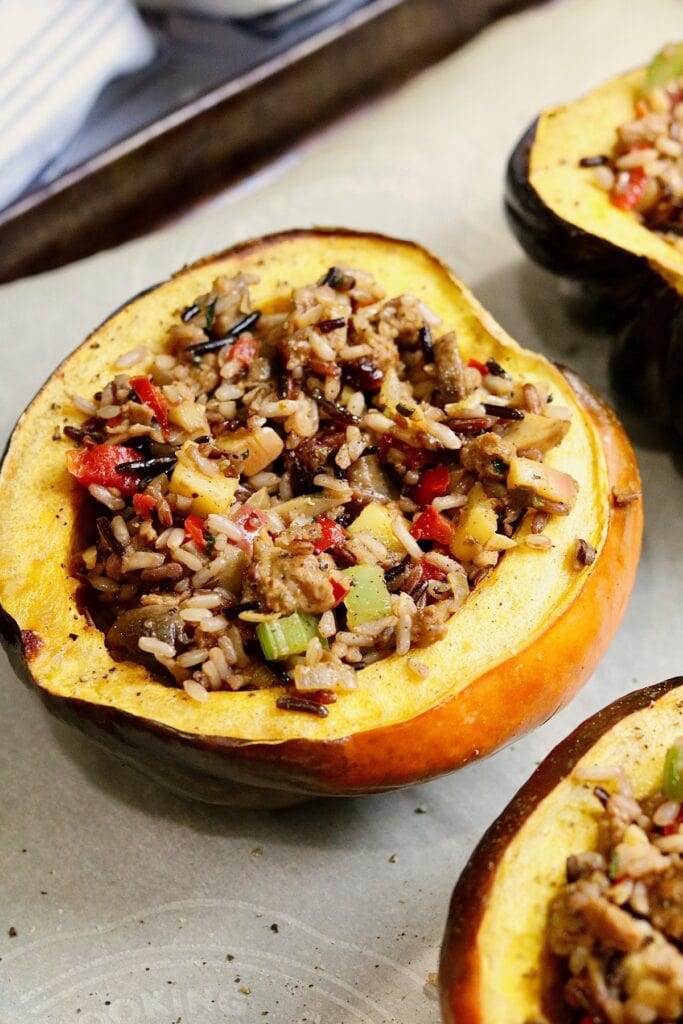 close up of a stuffed acorn squash that's been baked