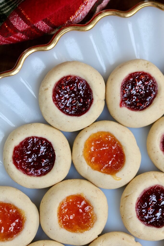 vegan thumbprint cookies on a Christmas plate
