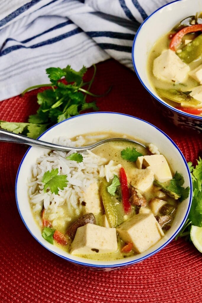 thai green curry in a bowl with rice