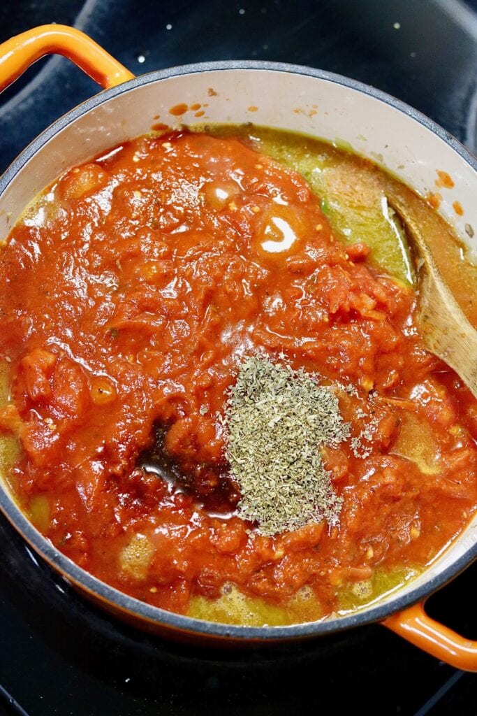 ingredients for vegan spaghetti sauce simmering in a pot