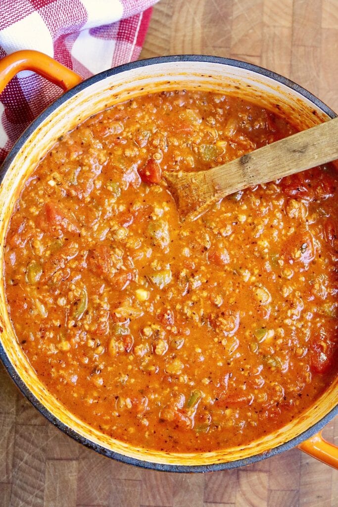 a pot of vegan spaghetti meat sauce on the stove ready to serve