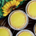 vegan lemon tarts on a cooling rack