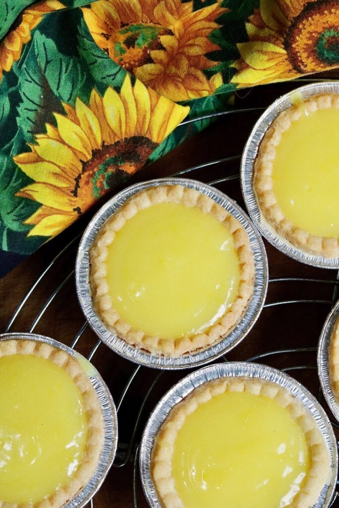 vegan lemon tarts on a cooling rack