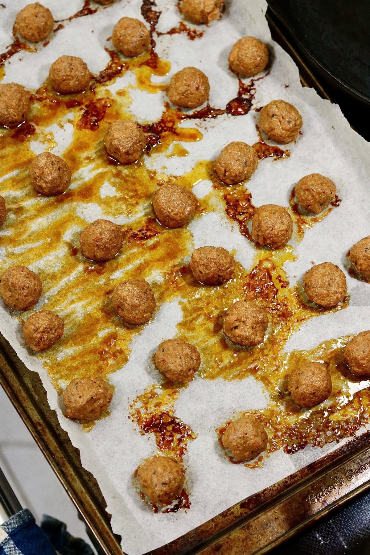 vegan meatballs baked on a sheet pan
