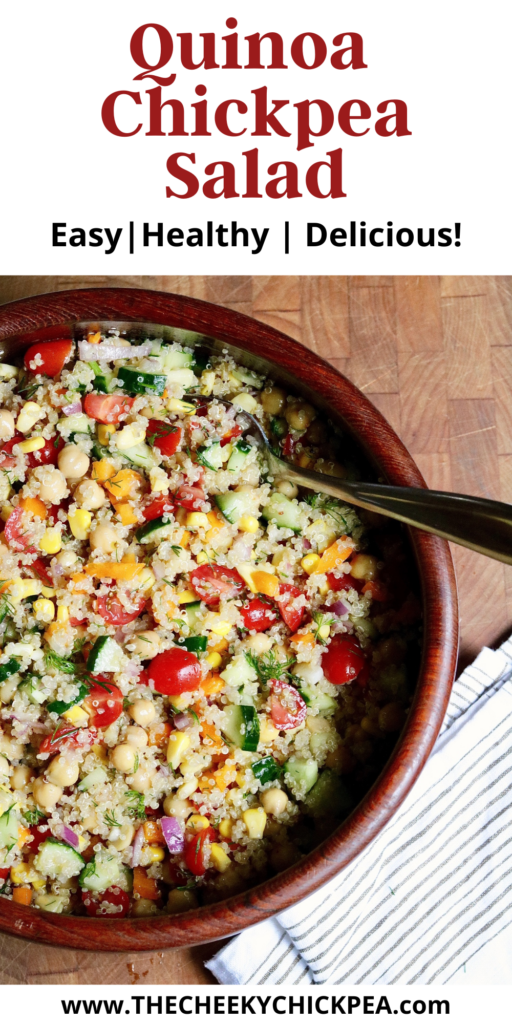 quinoa salad with chickpeas and veggies dressed in a bowl