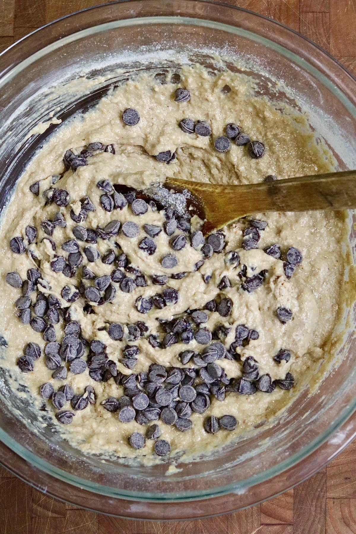 peanut butter muffin batter ingredients mixed in a bowl