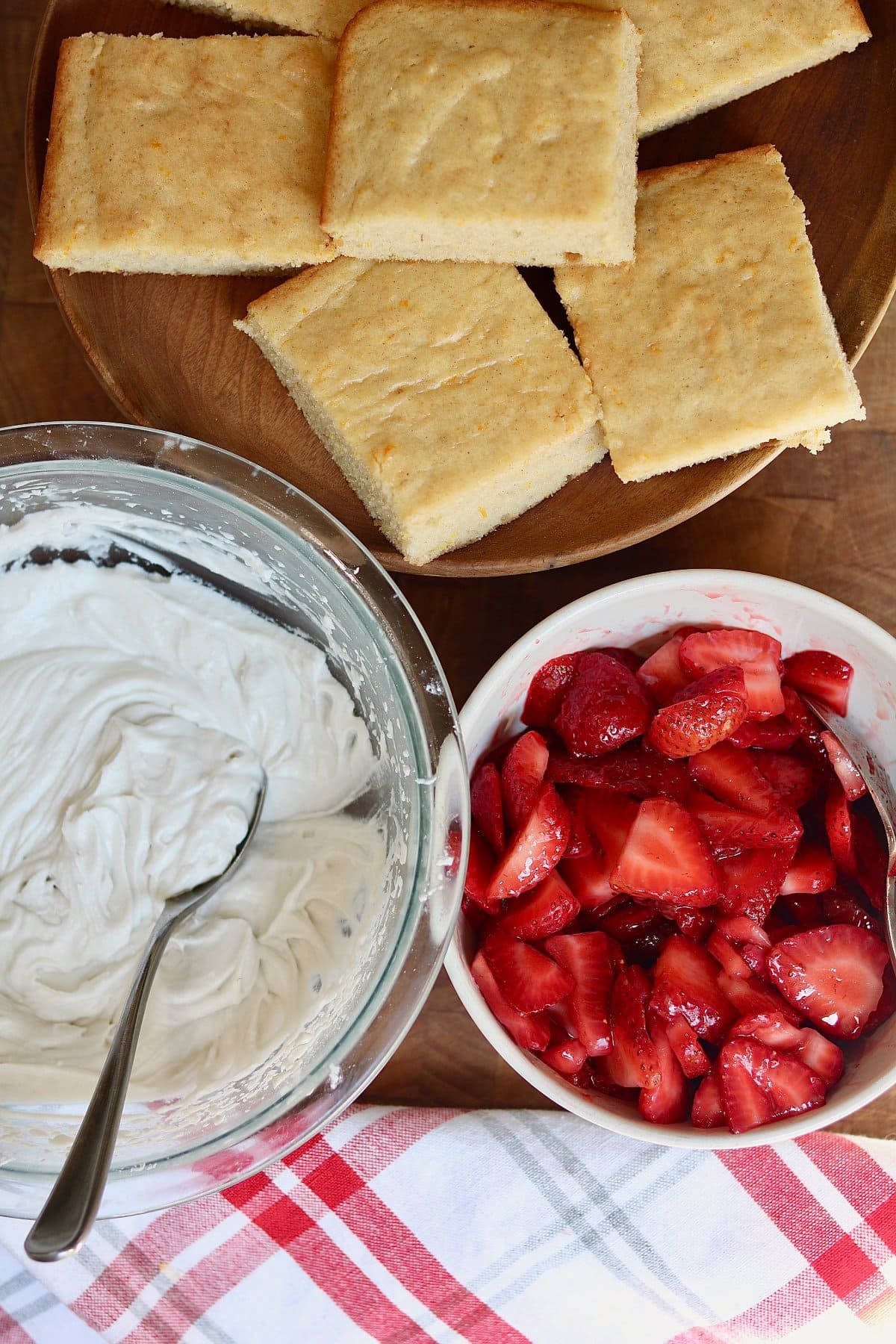 ingredients for vegan strawberry shortcake ready to assemble on the countertop