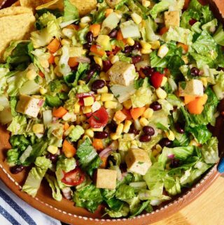 mexican chopped salad ready to serve in a large salad bowl
