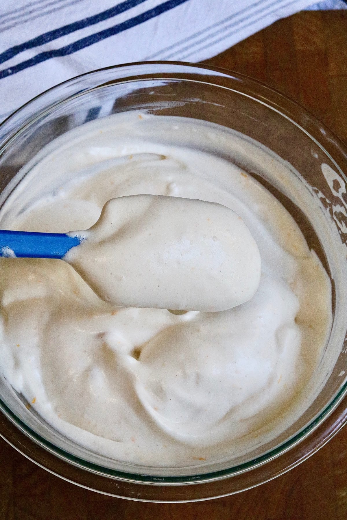 vegan whipped cream in a bowl with a spatula