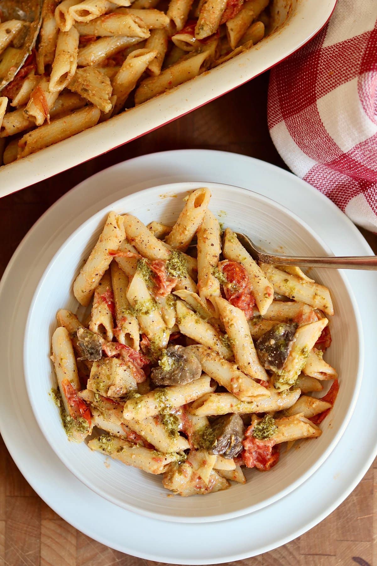 hummus pasta in bowl with a fork